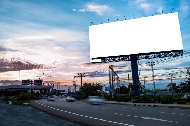 Blank billboard for outdoor advertising at twilight time